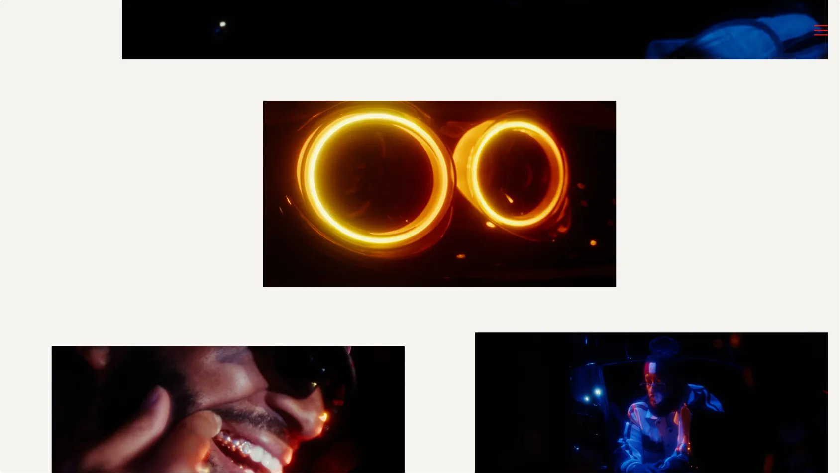 Close-up of two bright amber circular car headlights glowing in the dark.